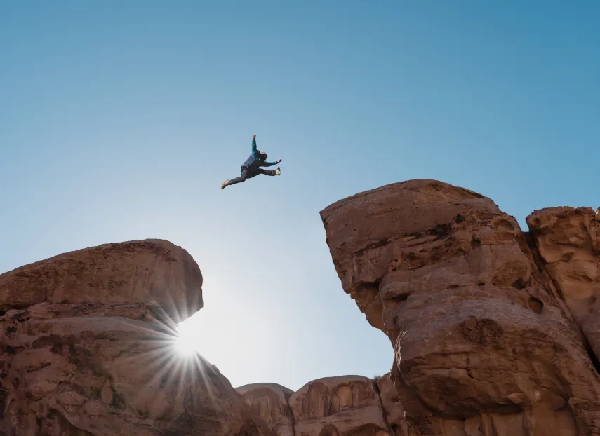 A person backlit against the sky as they leap from one boulder to another: Identifying challenges in third-party due diligence