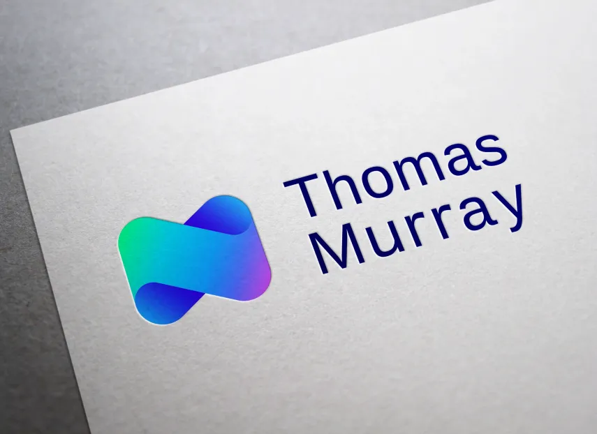 A New Brand for a New Chapter: Close up of the Thomas Murray logo on a business card
