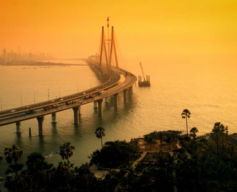 The Bandra-Worli Sea Link, also called Rajiv Gandhi Sea Link at dusk. It is a cable-stayed vehicular bridge that links Bandra in the northern suburb of Mumbai with Worli in South Mumbai. T+1 settlement cycles